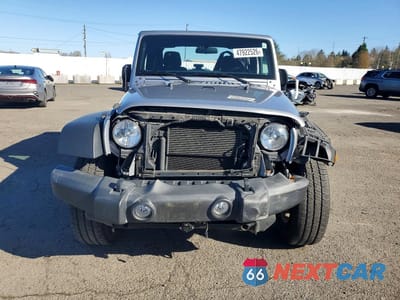 Piąte zdjęcie samochodu w środku: 2017 JEEP WRANGLER SPORT VIN:1C4GJWAG5HL660877 - miniatura