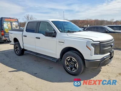 Czwarte zdjęcie samochodu z boku: 2022 FORD F150 LIGHTNING PRO VIN:1FTVW1EL1NWG14881 - miniatura