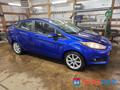 Czwarte zdjęcie samochodu z boku: 2015 FORD FIESTA SE VIN:3FADP4BJ1FM200570 - miniatura