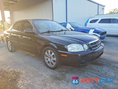 Czwarte zdjęcie samochodu z boku: 2005 KIA OPTIMA LX V6 VIN:KNAGD128955393130 - miniatura