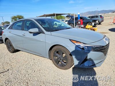 Czwarte zdjęcie samochodu z boku: 2021 HYUNDAI ELANTRA HYBRID BLUE VIN:KMHLM4AJ6MU012728 - miniatura