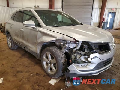 Czwarte zdjęcie samochodu z boku: 2017 LINCOLN MKC PREMIERE VIN:5LMCJ1C95HUL46911 - miniatura