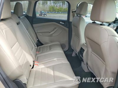 Zdjęcie 11 z 13 samochodu: 2017 FORD ESCAPE TITANIUM VIN:1FMCU9JD4HUD82072 - miniatura