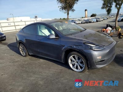Czwarte zdjęcie samochodu z boku: 2023 TESLA MODEL Y VIN:7SAYGDEEXPF647479 - miniatura