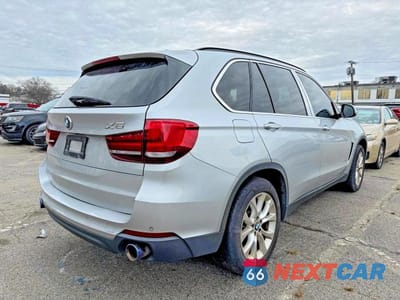 Czwarte zdjęcie samochodu z boku: 2016 BMW X5 SDRIVE35I VIN:5UXKR2C59G0R69371 - miniatura