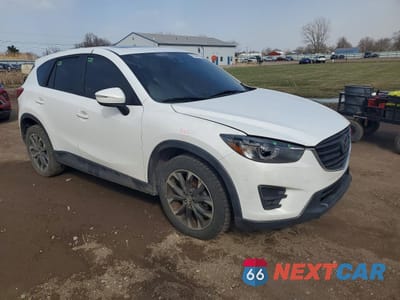 Czwarte zdjęcie samochodu z boku: 2016 MAZDA CX-5 GT VIN:JM3KE4DY9G0918350 - miniatura