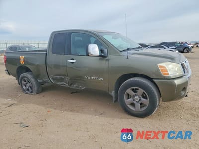 Czwarte zdjęcie samochodu z boku: 2005 NISSAN TITAN XE VIN:1N6AA06B95N525463 - miniatura