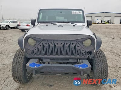 Piąte zdjęcie samochodu w środku: 2010 JEEP WRANGLER UNLIMITED SAHARA VIN:1J4BA5H16AL101702 - miniatura