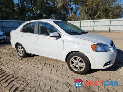 Czwarte zdjęcie samochodu z boku: 2011 CHEVROLET AVEO LS VIN:KL1TD5DE7BB127623 - miniatura