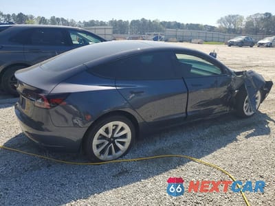 Trzecie zdjęcie samochodu z tyłu: 2023 TESLA MODEL 3 VIN:5YJ3E1EB8PF479052 - miniatura