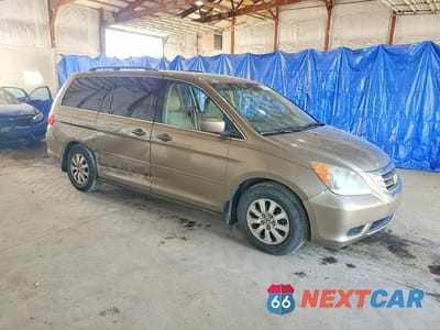 Czwarte zdjęcie samochodu z boku: 2009 HONDA ODYSSEY EXL VIN:5FNRL38749B000633 - miniatura