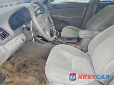 Zdjęcie 7 z 12 samochodu: 2003 TOYOTA CAMRY LE VIN:4T1BE32K23U786788 - miniatura