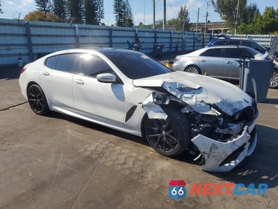 Czwarte zdjęcie samochodu z boku: 2022 BMW M850XI VIN:WBAGV8C01NCJ74706 - miniatura