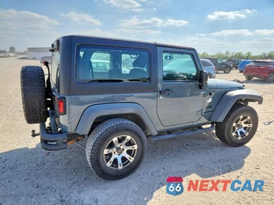 Trzecie zdjęcie samochodu z tyłu: 2015 JEEP WRANGLER SPORT VIN:1C4GJWAG1FL663207 - miniatura
