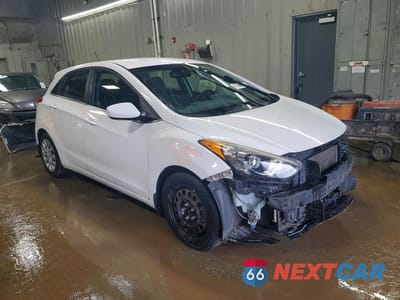Czwarte zdjęcie samochodu z boku: 2016 HYUNDAI ELANTRA GT BASE VIN:KMHD35LH5GU268533 - miniatura