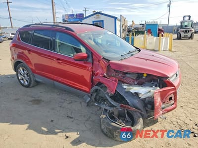 Czwarte zdjęcie samochodu z boku: 2014 FORD ESCAPE SE VIN:1FMCU9GX3EUB80739 - miniatura