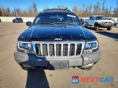 Piąte zdjęcie samochodu w środku: 2002 JEEP GRAND CHEROKEE SPORT VIN:1J8GW38S42C236293 - miniatura