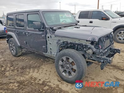 Czwarte zdjęcie samochodu z boku: 2019 JEEP WRANGLER UNLIMITED SAHARA VIN:1C4HJXEN0KW686859 - miniatura