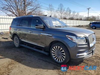 Czwarte zdjęcie samochodu z boku: 2018 LINCOLN NAVIGATOR RESERVE VIN:5LMJJ2LT4JEL19370 - miniatura