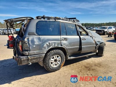 Trzecie zdjęcie samochodu z tyłu: 1999 LEXUS LX 470 BASE VIN:JT6HT00W7X0048644 - miniatura
