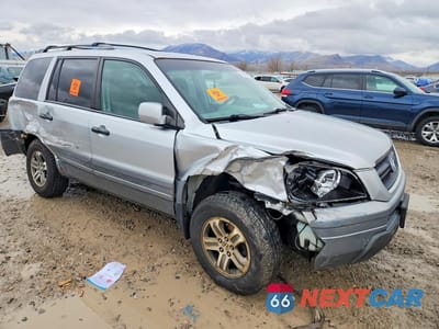 Czwarte zdjęcie samochodu z boku: 2005 HONDA PILOT EX VIN:2HKYF18475H526151 - miniatura