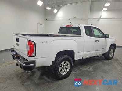 Trzecie zdjęcie samochodu z tyłu: 2016 GMC CANYON VIN:1GTH6BE36G1141630 - miniatura