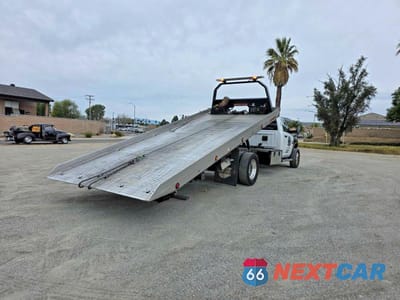 Czwarte zdjęcie samochodu z boku: 2017 RAM 5500 TRUCKS TOW TRUCK VIN:3C7WRNDL6HG680711 - miniatura