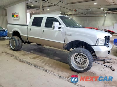 Czwarte zdjęcie samochodu z boku: 2003 FORD F250 SUPER DUTY VIN:1FTNW21P83ED22064 - miniatura