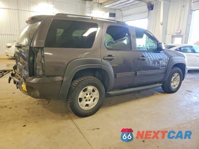 Trzecie zdjęcie samochodu z tyłu: 2011 CHEVROLET TAHOE K1500 LS VIN:1GNSKAE08BR200891 - miniatura