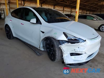 Czwarte zdjęcie samochodu z boku: 2022 TESLA MODEL Y VIN:7SAYGDEF1NF494450 - miniatura
