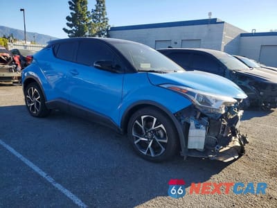 Czwarte zdjęcie samochodu z boku: 2019 TOYOTA C-HR XLE VIN:JTNKHMBX7K1023254 - miniatura
