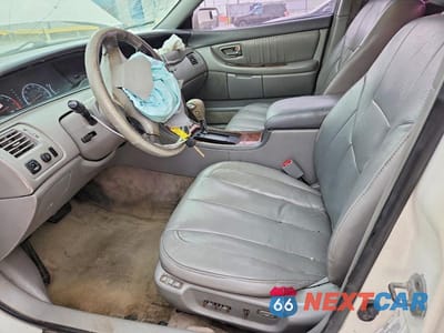 Zdjęcie 7 z 12 samochodu: 2000 TOYOTA AVALON XLS VIN:4T1BF28B6YU095611 - miniatura