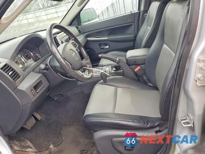 Zdjęcie 7 z 14 samochodu: 2009 JEEP GRAND CHEROKEE LAREDO VIN:1J8GS48K59C521046 - miniatura