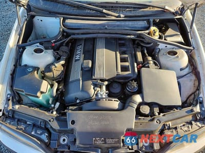 Zdjęcie 11 z 11 samochodu: 2003 BMW 325 I VIN:WBAET37403NJ39184 - miniatura