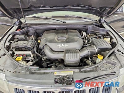 Zdjęcie 12 z 13 samochodu: 2013 JEEP GRAND CHEROKEE LAREDO VIN:1C4RJFAGXDC569056 - miniatura