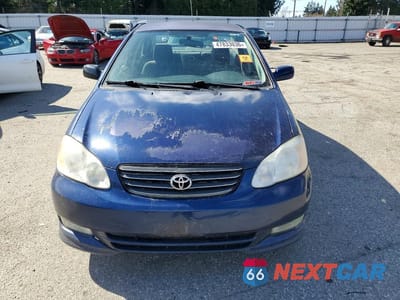 Piąte zdjęcie samochodu w środku: 2003 TOYOTA COROLLA S VIN:1NXBR32E93Z049697 - miniatura