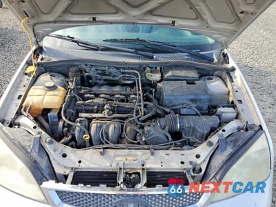 Zdjęcie 11 z 12 samochodu: 2005 FORD FOCUS ZX5 VIN:3FAFP37NX5R150378 - miniatura