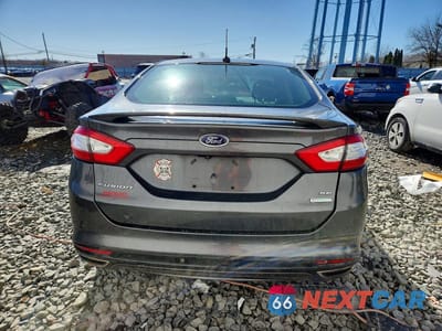 Zdjęcie 6 z 12 samochodu: 2016 FORD FUSION SE VIN:3FA6P0H93GR393792 - miniatura