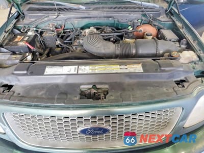 Zdjęcie 11 z 12 samochodu: 1999 FORD F150 VIN:1FTRX18L1XNA06068 - miniatura