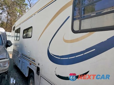 Trzecie zdjęcie samochodu z tyłu: 1999 FORD COACHMAN RV VIN:1FDXE40S5XHA44673 - miniatura