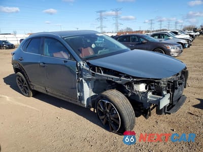 Czwarte zdjęcie samochodu z boku: 2022 MAZDA CX-30 PREFERRED VIN:3MVDMBCL1NM422725 - miniatura