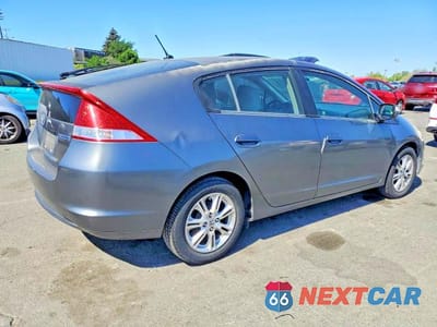 Trzecie zdjęcie samochodu z tyłu: 2010 HONDA INSIGHT EX VIN:JHMZE2H70AS008559 - miniatura