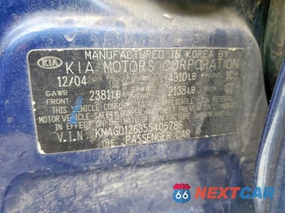 Zdjęcie 13 z 13 samochodu: 2005 KIA OPTIMA LX VIN:KNAGD126355405786 - miniatura