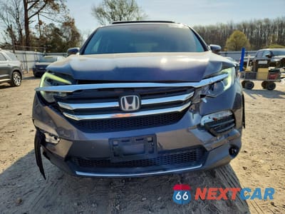 Piąte zdjęcie samochodu w środku: 2017 HONDA PILOT ELITE VIN:5FNYF6H08HB092870 - miniatura