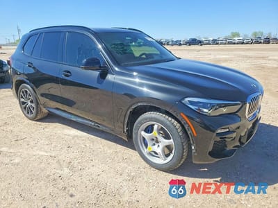 Czwarte zdjęcie samochodu z boku: 2021 BMW X5 XDRIVE40I VIN:5UXCR6C06M9E55259 - miniatura