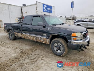 Czwarte zdjęcie samochodu z boku: 2003 GMC NEW SIERRA K1500 VIN:1GTEK19T13E325671 - miniatura
