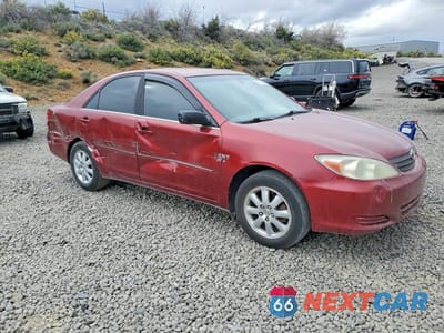 Czwarte zdjęcie samochodu z boku: 2002 TOYOTA CAMRY XLE VIN:JTDBE30K520063837 - miniatura