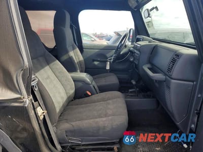 Zdjęcie 10 z 12 samochodu: 2004 JEEP WRANGLER / TJ SPORT VIN:1J4FA49S84P801236 - miniatura