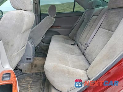 Zdjęcie 10 z 11 samochodu: 2002 TOYOTA CAMRY XLE VIN:JTDBE30K520063837 - miniatura