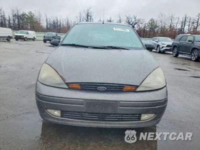 Piąte zdjęcie samochodu w środku: 2003 FORD FOCUS ZX5 VIN:3FAFP37Z43R160856 - miniatura